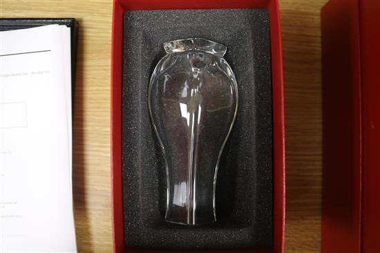 A Baccarat decanter and two vases, all cased decanter height 34.5cm